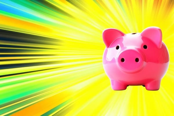 Pop illustration of a piggy bank surrounded by bright light